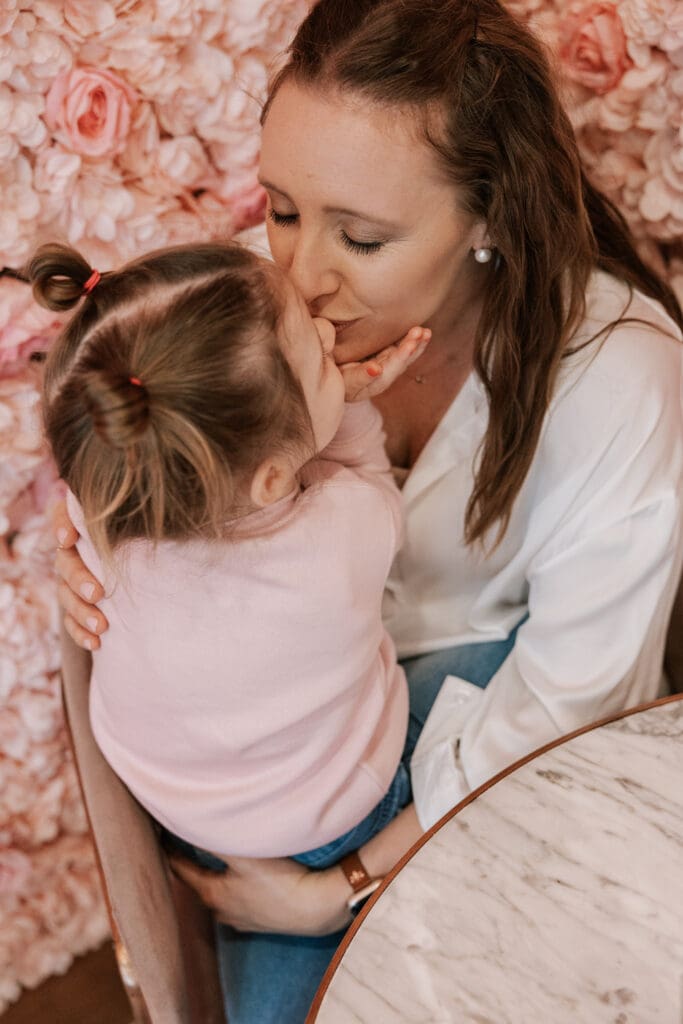 Ashley spending quality time with her daughter while working from home